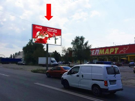 Фото рекламної площини за адресою Тракторостроителей пр., 57, супермаркеты "Велмарт", "Сильпо", "Фокстрот", ТРЦ "Украина", в сторону Салтовское шоссе