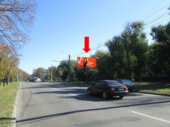 Фото рекламної площини за адресою Московский пр., 242/2 / Хмельницкого бул., возле стадиона «ХТЗ», из центра