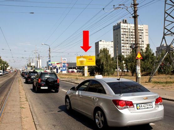 Фото рекламної площини за адресою Гагарина пр., 21-А, возле АЗС "ТНК", супермаркета "Новус", ресторана "КФС", в сторону ст. м. "Черниговской"