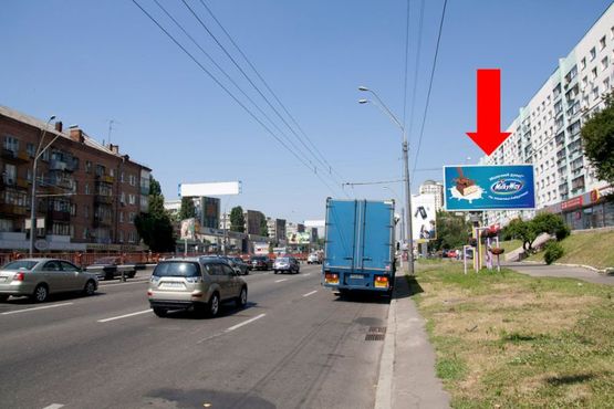 Фото рекламной плоскости по адресу Победы пр., 20 / Шолуденка ул., из центра