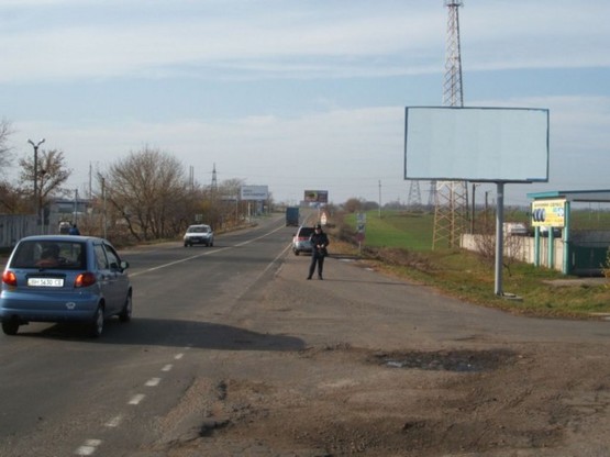 Фото рекламной плоскости по адресу Одесса - Кучурган 11+750 А