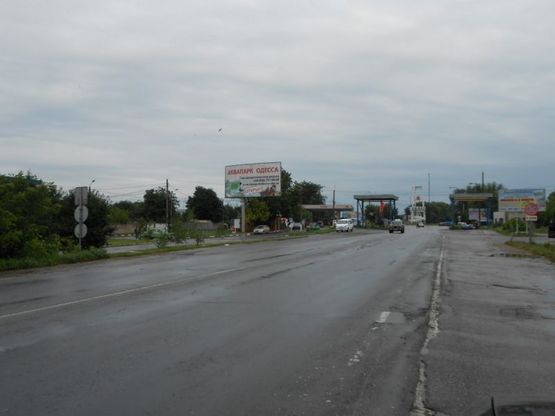 Фото рекламной плоскости по адресу Одесса - Кучурган 11+750 Б