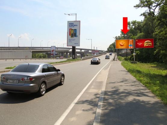 Фото рекламной плоскости по адресу Надднепрянское шоссе, заезд на мост Дарницкий , из центра