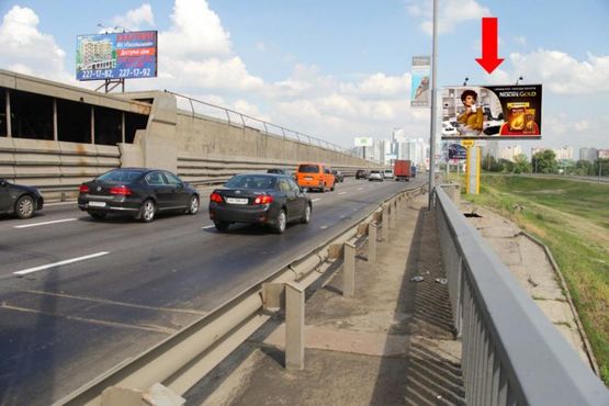 Фото рекламной плоскости по адресу Бажана пр., съезд с мост Южный , в сторону Харьковская пл.