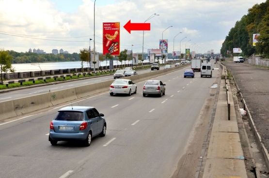Фото рекламной плоскости по адресу Набережное шоссе, 100м от моста Пешеходного , в сторону ст. м. "Днепр"