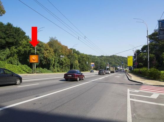 Фото рекламної площини за адресою Дружбы Народов бул. / ул. Кургановская, в сторону моста Патона, Набережного шоссе