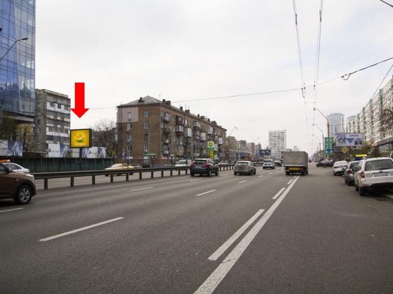 Фото рекламной плоскости по адресу Победы пр., 13 / ул. Шолуденко, из центра