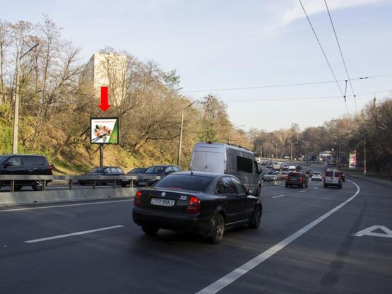 Фото рекламной плоскости по адресу Телиги ул., 500 м. до моста над ул. Кирилловской (бывш. ул. Фрунзе), в сторону ст. м. "Почайна"