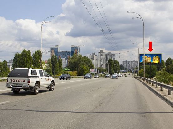 Фото рекламной плоскости по адресу Полярная ул., 12, на мосту, в сторону супермаркетов "Эпицентр", "Сильпо", ул. Богатырской