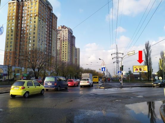 Фото рекламной плоскости по адресу Хоткевича ул. - пр. Гагарина, возле ТРЦ "Проспект", супермаркета "Ашан", на светофоре, в сторону ст.м. "Черниговская"