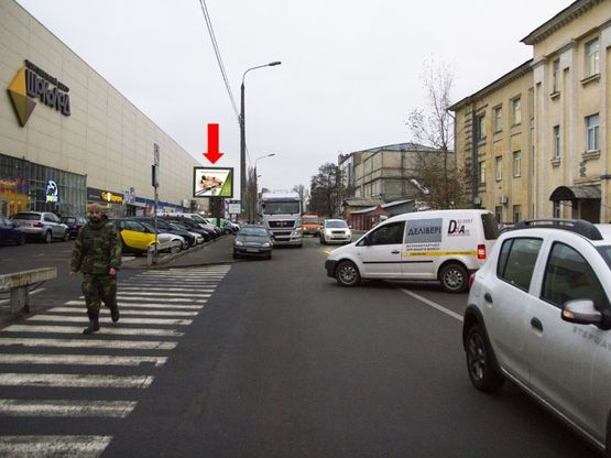 Фото рекламной плоскости по адресу Константиновская ул., 71, возле ТЦ "Шоколад", "АТБ", из центра