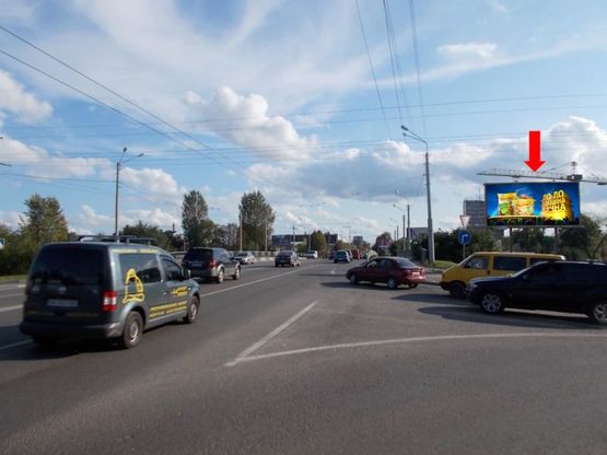 Фото рекламной плоскости по адресу Стрыйская ул. / Луганская ул., ж/д мост, из центра