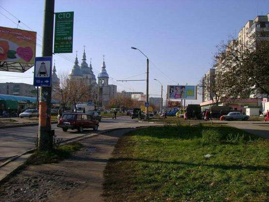 Фото рекламної площини за адресою Широкая ул., возле торгового центра