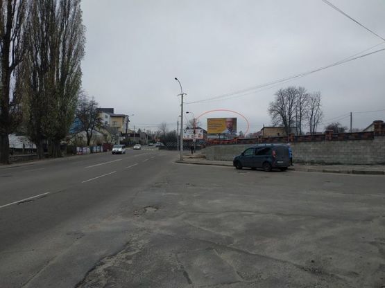 Фото рекламной плоскости по адресу Поповича  -  Чернишова ( поруч з огорожею авторем.зав.) П