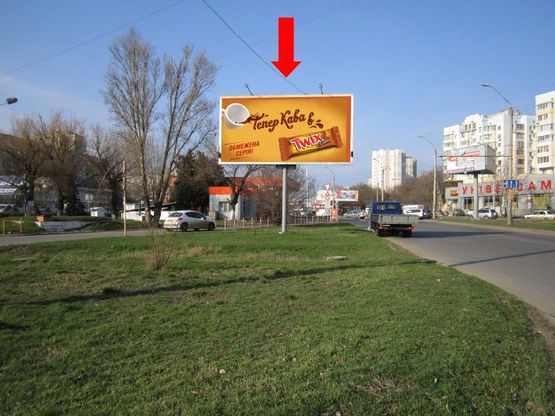 Фото рекламної площини за адресою Небесной Сотни пр. (бывш. Жукова пр.) / Левитана ул., возле супермаркета "Копейка", в центр