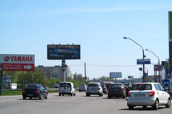 Фото рекламной плоскости по адресу Зодчих вул., 14 (в напр. Одеської пл.)