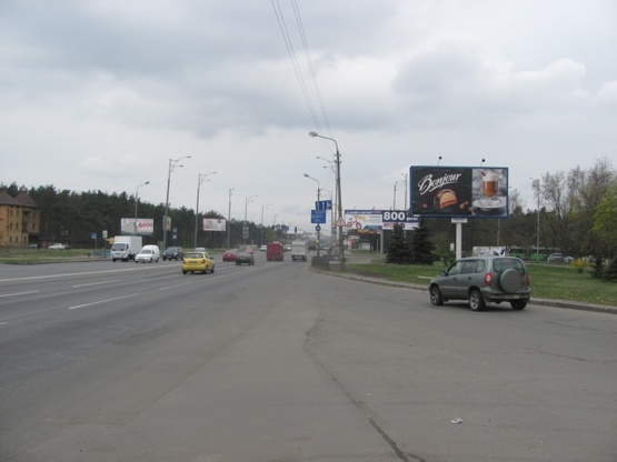 Фото рекламной плоскости по адресу Братиславская ул., 42 - просп. Лесной (АЗС "ТНК", сьезд с ул. Академика Курчатова на ул. Братиславскую, в направлении просп. Ватутина Ген.)