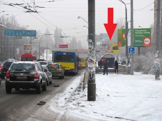 Фото рекламной плоскости по адресу Довженко ул., 14 (магазин "Энран Акрос", клуб "Ника", в направлении ул. О.Телиги), призма