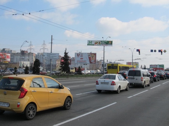 Фото рекламной плоскости по адресу Ватутина Ген. просп., 22 - бул. Перова (на разделителе), АЗС "WOG", Moto GP салон, в направ. ул. Братиславской