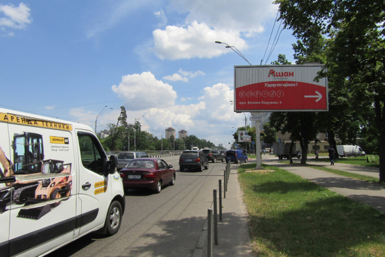 Фото рекламной плоскости по адресу Победы просп./ съезд на Кольцевую дорогу (Киевский международный Ин-т,в сторону центра города)