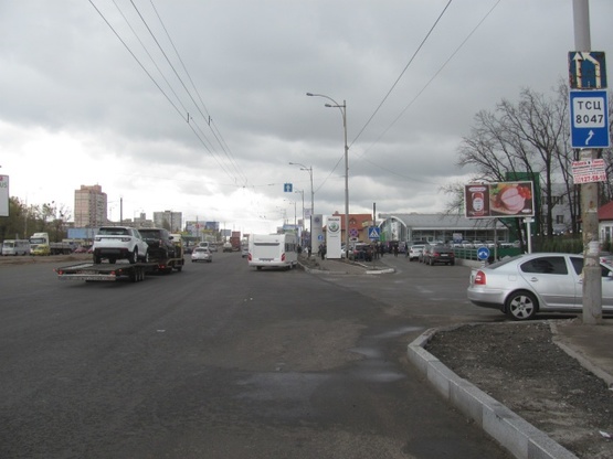 Фото рекламної площини за адресою Кольцевая дорога, км 3+255 справа ( перед автосалоном "Шкода", клуб "Формула", УкрСибБанк), в направ. прос. Леся Курбаса