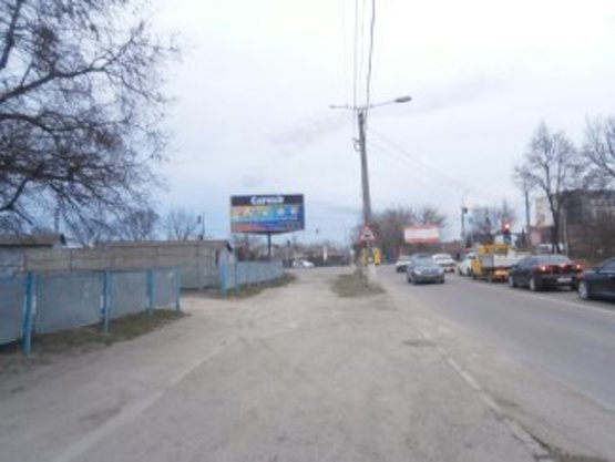 Фото рекламної площини за адресою Петлюри-Коновальця перехрестя