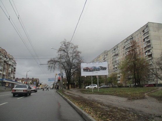 Фото рекламной плоскости по адресу Холодногорская ул.4 (Елизарова ул.), (Райффайзен Банк Аваль, ОщадБанк, 500м. К ст. м. Холодня Гора, ERSTE Банк), в сторону ул. Верхнегиевской