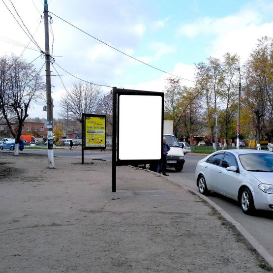 Фото рекламной плоскости по адресу Находится на центральной площади города по ул. Савченко, 2, рядом "ПриватБанк", магазин "Watsons" , автобусная остановка "ПриватБанк".
