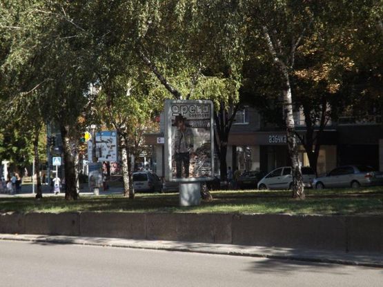 Фото рекламной плоскости по адресу пр.О.Поля, 12/пр. Кирова, 12