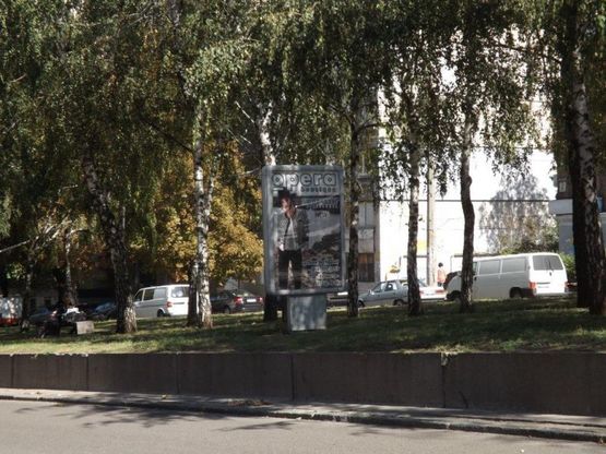 Фото рекламной плоскости по адресу пр.О.Поля, 12/пр. Кирова, 12