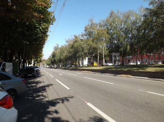 Фото рекламной плоскости по адресу пр.О.Поля, 12/пр. Кирова, 12