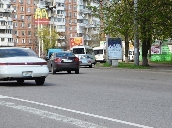 Фото рекламной плоскости по адресу Запорізьке шосе, 1 (р-н Підстанції)/Запорожское шоссе, 1 (р-н подстанции) напротив рынка