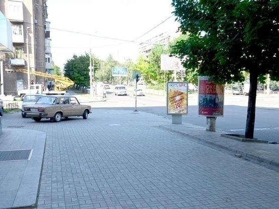 Фото рекламной плоскости по адресу пр.Александра Поля, 12 (маг. Інтертоп) пішохідний перехід/пр. Кирова, 12 (маг. Интертоп) пешеходный переход