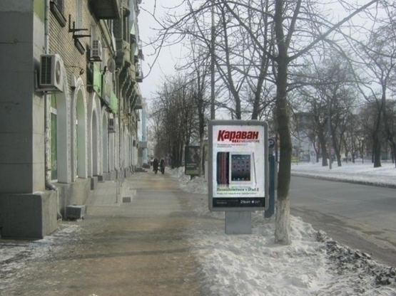 Фото рекламной плоскости по адресу пр.Дмитра Яворницького 78, крамничка гаджетів BASS (Номер 4)/пр.К. Маркса, 78, магазин гаджетов BASS (Номер 4)