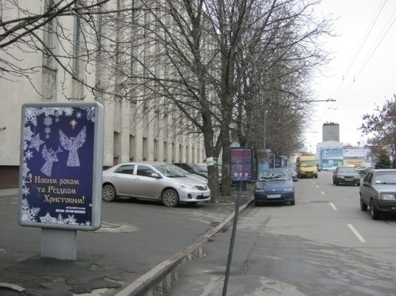 Фото рекламной плоскости по адресу пр.Дмитра Яворницького, 93 (5), Будинок Профспілок, НОМЕР5/пр. К. Маркса, 93(5), Дом Союзов, НОМЕР5