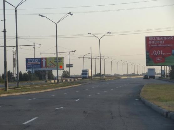 Фото рекламной плоскости по адресу Кайдакський міст/Кайдакский мост, поток движения на левый берег, в сторону ТЦ Караван