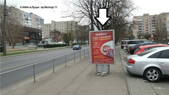 Фото рекламної площини за адресою на розі проспектів Молоді та Соборності. (територія ТЦ "Гостинець", квітникового ринку)