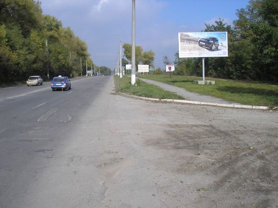 Фото рекламной плоскости по адресу Хмельницьке шосе 50м після цеху з-д Модуль