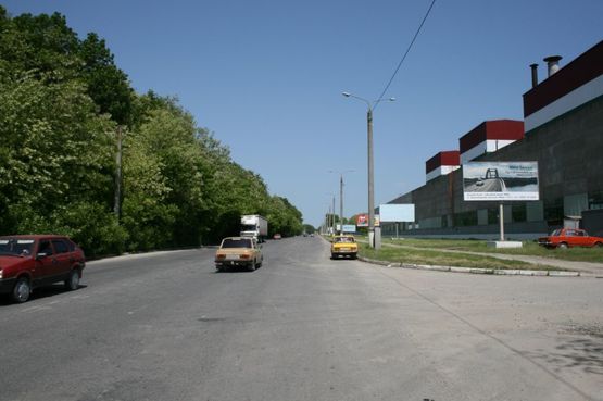Фото рекламной плоскости по адресу Хмельницьке шосе перед цехом з-д Модуль