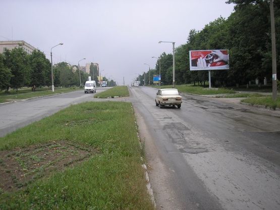 Фото рекламної площини за адресою пр.Грушевського перед в’їздом на СТО