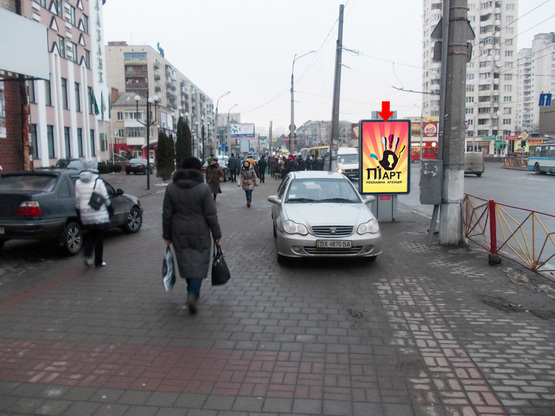 Фото рекламной плоскости по адресу Ул.Каменецкая (напротив ТЦ "Либидь Плаза") №1