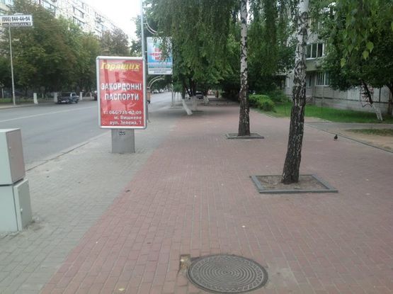 Фото рекламної площини за адресою вул.Жовтнева 2-24