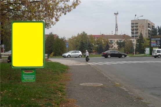 Фото рекламной плоскости по адресу м.Ужгород Слов'янська набережна, біля гот.Ужгород, ресторану Венеція, в сторону транспортного мосту