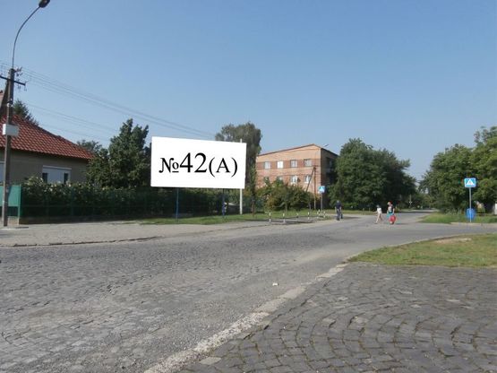 Фото рекламной плоскости по адресу вул. К. Карого-Каменського (біля церкви)