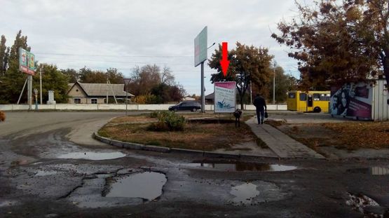 Фото рекламної площини за адресою ул. Днепровская-пр-т Шахтостроителей, 1, м-н "Автомир" (Б)