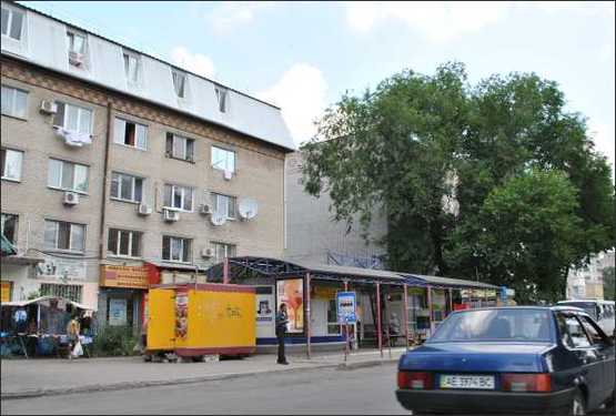 Фото рекламной плоскости по адресу ул. Сучкова, 28 на остановке