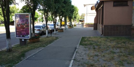 Фото рекламної площини за адресою ул. Победы, в районе д. № 1 возле "Дом кофе" в сторону университета