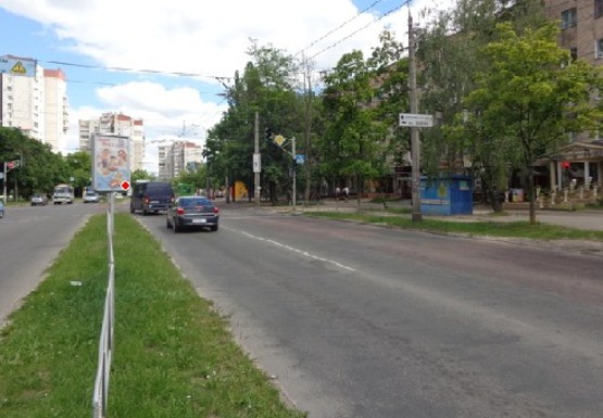 Фото рекламной плоскости по адресу Рокоссовского ул. - Доценка ул., кафе Сан-Сити