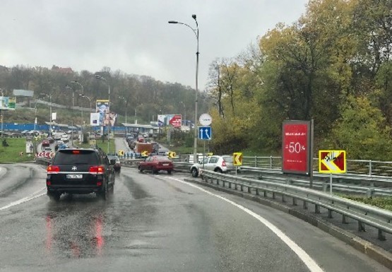 Фото рекламной плоскости по адресу Наводницкий путепровод съезд на Дружбы Народов бул.