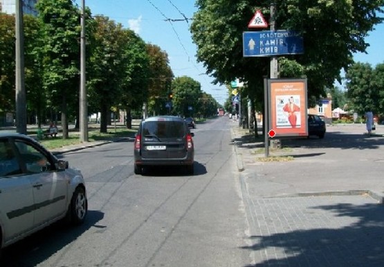Фото рекламной плоскости по адресу Шевченко б-р. - Святотроицкая ул.